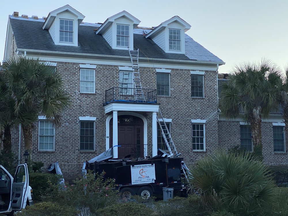 Slide of Alpha Roofing Services