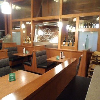 White Spot - Indoor waterfall near a couple of bench seats - Canadian (New) Near Me - Victoria, British Columbia
