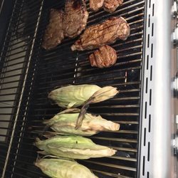 Publix Chelsea 280 - Grilled corn with paprika, cayenne salt pepper and dealers choice ribeyes, filet mignon, New York strip on my grill :)
