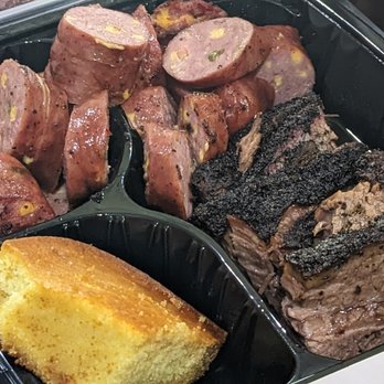 The Slow Bone - Jalapeno cheese sausage, marbled brisket and cornbread - Barbeque Near Me - Dallas, Texas The Slow Bone - Jalapeno cheese sausage, marbled brisket and cornbread - Barbeque Near Me - Dallas, Texas