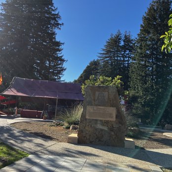 Sankat Mochan Hanuman Temple - Baba ji's picture and story at one of the stairs leading to the temple - Hindu Temples Near Me - Watsonville, California
