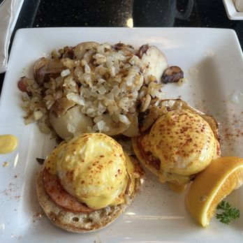 Keke's Breakfast Cafe - Eggs Benedict- extra onion on home fries - Breakfast & Brunch Near Me - Cape Coral, Florida Keke's Breakfast Cafe - Eggs Benedict- extra onion on home fries - Breakfast & Brunch Near Me - Cape Coral, Florida