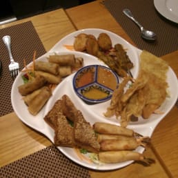Shared starter, prawn toast, fishcakes, prawn wonton, spring rolls and chicken skewers