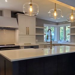 Design Concepts Expert Contractors - Luxury kitchen Munster IN 46321 custom cabinetry, quartzite countertops, lighting tile painting hardwood floors.