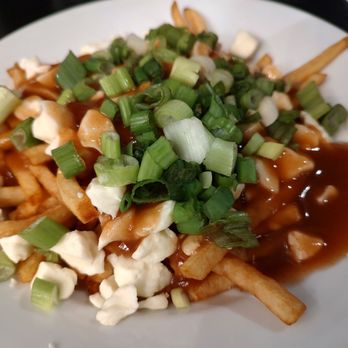 Poutineville - Skinny fries, cheese curds and green onions - Poutineries Near Me - Montreal, Quebec Poutineville - Skinny fries, cheese curds and green onions - Poutineries Near Me - Montreal, Quebec
