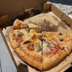 Elliott’s Pizzeria - 2 different pizzas for the veggie lovers & the meat lovers.