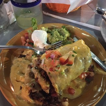 Taquilo's - Brisket Burrito- couldn't wait to dive in as you can see - Mexican Near Me - Galveston, Texas Taquilo's - Brisket Burrito- couldn't wait to dive in as you can see - Mexican Near Me - Galveston, Texas