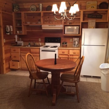 Pinewood Cabins - Nice kitchen. (Excuse the flashlight on the table.) - Vacation Rentals Near Me - Mountain View, Arkansas
