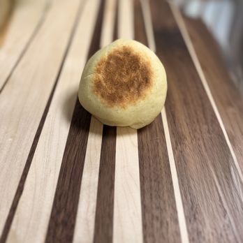 1868 Bakes - Sourdough English Muffins - Soft, griddled, and perfect for breakfast sandwiches or a slather of butter. - Bakeries Near Me - Saco, Maine 1868 Bakes - Sourdough English Muffins - Soft, griddled, and perfect for breakfast sandwiches or a slather of butter. - Bakeries Near Me - Saco, Maine