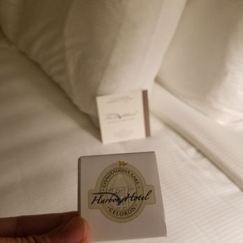 Chautauqua Harbor Hotel - Thumbs up for the turn-down service complete with tasty chocolates on the bed. - Hotels Near Me - Celoron, New York Chautauqua Harbor Hotel - Thumbs up for the turn-down service complete with tasty chocolates on the bed. - Hotels Near Me - Celoron, New York