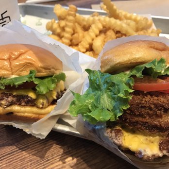 Shake Shack Glendale - Regular cheese burger on the left and with a fried Portobello mushroom on the right. - Burgers Near Me - Glendale, California