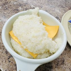 Don's Grill - Grits with cheese. $0.60 extra for cheese