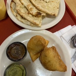 Garlic Naan, vegetable samosa Garlic Naan, vegetable samosa