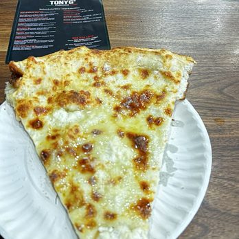Tony G’s Pizzeria - Delicious cheese pizza slice - Pizza Near Me - Hamilton, Ontario Tony G’s Pizzeria - Delicious cheese pizza slice - Pizza Near Me - Hamilton, Ontario