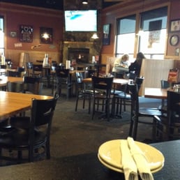 this is a picture of some tables and a big television