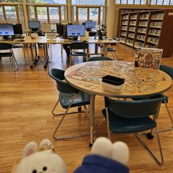 Hawaii State Public Library System - Liliha Library - Jigsaw puzzle and computers to share!