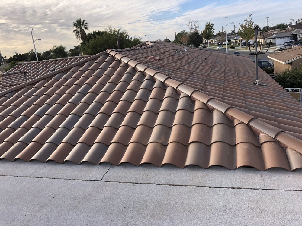 Slide of ARM Roofing Specialists