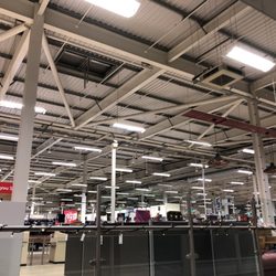 Tesco - Huge inside with an escalator. Open 24/7!!!