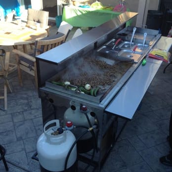 Tacos Revolucion - The meat for the tacos cooking right in front of you - Caterers Near Me Tacos Revolucion - The meat for the tacos cooking right in front of you - Caterers Near Me