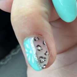 The paint/design is from another place. But you can see where they cut my cuticle in the top right.