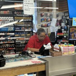 Circle K - Attendant too absorbed in phone to pay attention to customers.