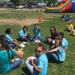 Our Lady of the Assumption School - OLA students & the principal enjoying lunch on field day 2018.