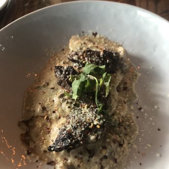 Mia Bella Trattoria - Beef Tenderloin Medallions with mushroom ravioli in a peppercorn sauce - Italian Near Me - Houston, Texas