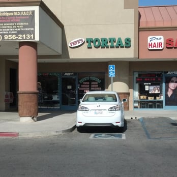 Pepe's Tortas - a car parked in front of a store - Mexican Near Me - Perris, California