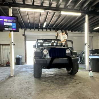 Nu-Tint - Nice, well-lit installation area with TV for customers - Windshield Installation & Repair Near Me - Tucson, Arizona Nu-Tint - Nice, well-lit installation area with TV for customers - Windshield Installation & Repair Near Me - Tucson, Arizona