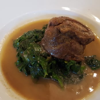 La Gare - Sous vide prepared lamb roll with Provence herbs and eggplant caviar served on shallot sauteed spinach. - French Near Me - Prague, Puerto Rico