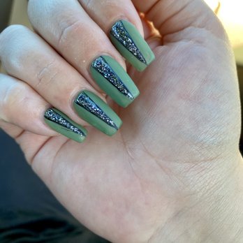 Fancy Nails - Matte green coffin shaped nails with glossy black glitter down the center so pretty and so many compliments - Nail Salons Near Me - Seaside, California Fancy Nails - Matte green coffin shaped nails with glossy black glitter down the center so pretty and so many compliments - Nail Salons Near Me - Seaside, California