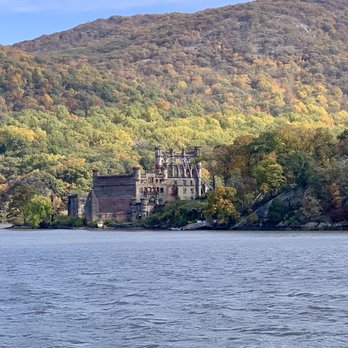 Pride of the Hudson - Boat view of Bannerman's Castle against the fall foliage. - Boating Near Me - Highland, New York