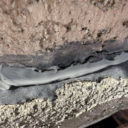 New sealant not even covering cracks in older sealant.