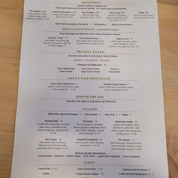 Bartlet Street - Menu - The menu from Bartlet Street cafe in Andover, MA, displays sections for smoothies, open-faced bagel sandwiches, baked goods, and sides. It includes options for dietary preferences such as gluten-free, vegan, and vegetarian, with detailed descriptions and prices. The menu emphasizes fresh, organic ingredients and offers a variety of breakfast and lunch items, including spreads, fritatas, soups, salads, and sides like fries and falafel. - Pizza Near Me - Andover, Massachusetts