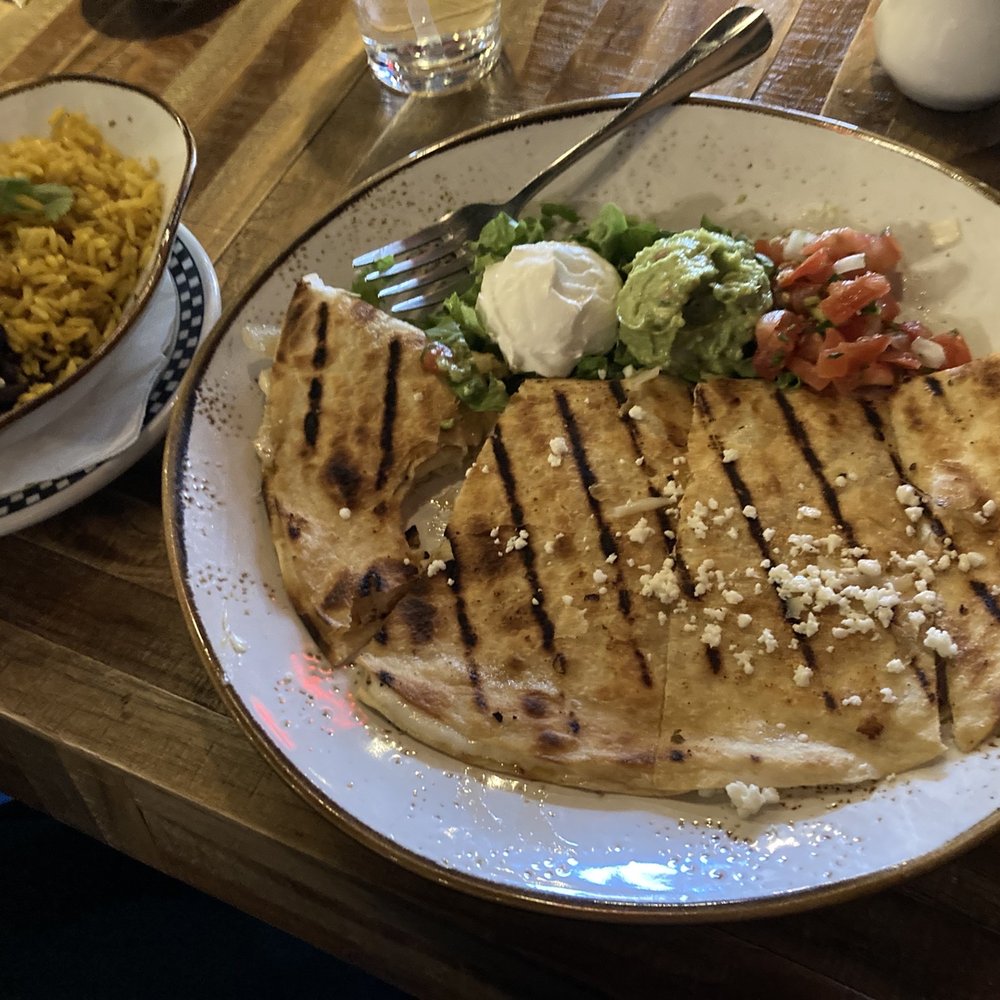 Table Mesa - Shrimp quesadilla (minus a few bites) - Latin American Near Me - Bentonville, Arkansas Table Mesa - Shrimp quesadilla (minus a few bites) - Latin American Near Me - Bentonville, Arkansas