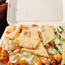 Empire Halal Grill - Chicken over rice with a pita