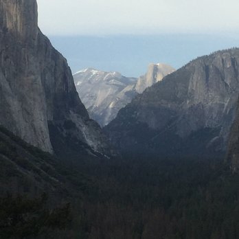 Tunnel View - Half Dome in the distance - Local Flavor Near Me - Yosemite National Park, California Tunnel View - Half Dome in the distance - Local Flavor Near Me - Yosemite National Park, California