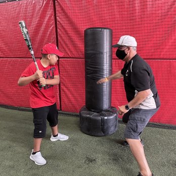 Ridge Rats Batting Cages - Willie teaching swing and strength. - Batting Cages Near Me - Miami, Florida Ridge Rats Batting Cages - Willie teaching swing and strength. - Batting Cages Near Me - Miami, Florida