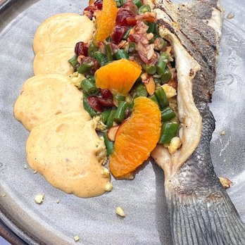Ahso Restaurant - Grilled branzino w/green beans, cranberries, cauliflower couscous, shaved almond, mandarin oranges, and emulsified brown butter - New American Near Me - Brambleton, Virginia Ahso Restaurant - Grilled branzino w/green beans, cranberries, cauliflower couscous, shaved almond, mandarin oranges, and emulsified brown butter - New American Near Me - Brambleton, Virginia