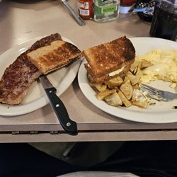 Charlie's Place - Steak and eggs w/cheese, wheat toast and home fries.