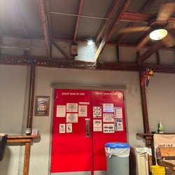 Shenanigans Night Club - Large spider nest above the back door. Mwahaha