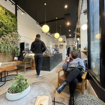 Caffe Mira - two people in a coffee shop - Cafes Near Me - Vancouver, British Columbia Caffe Mira - two people in a coffee shop - Cafes Near Me - Vancouver, British Columbia