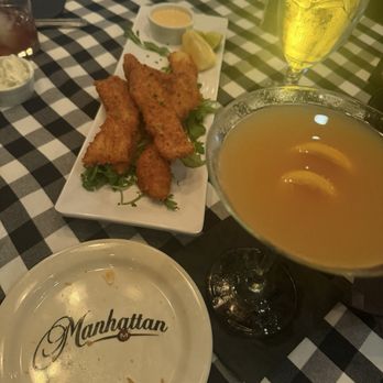 Manhattan Restaurant - Panko calamari appetizer with tangerine cosmopolitan - Steakhouses Near Me - Fresno, California Manhattan Restaurant - Panko calamari appetizer with tangerine cosmopolitan - Steakhouses Near Me - Fresno, California