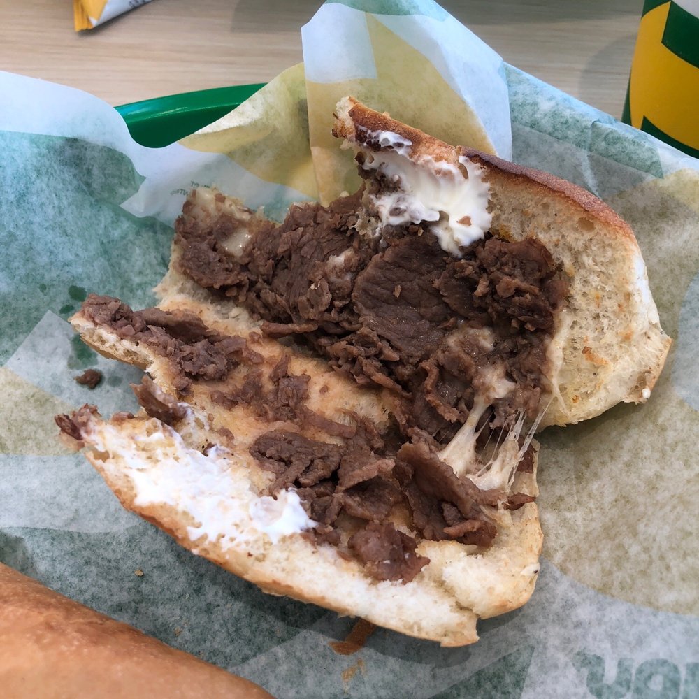 Subway - a close up of a sandwich with meat and cheese - Fast Food Near Me - Gilmer, Texas Subway - a close up of a sandwich with meat and cheese - Fast Food Near Me - Gilmer, Texas