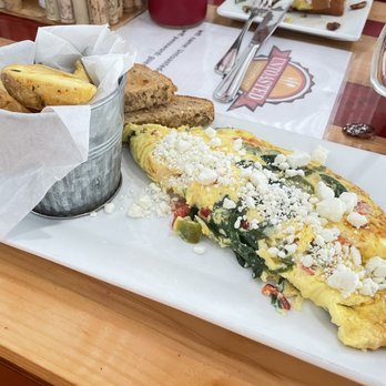 Untoasted - Omelette with spinach, peppers & goat cheese -- so good. Potato wedges are crispy and a slight rosemary taste. - Breakfast & Brunch Near Me - Hallandale Beach, Florida Untoasted - Omelette with spinach, peppers & goat cheese -- so good. Potato wedges are crispy and a slight rosemary taste. - Breakfast & Brunch Near Me - Hallandale Beach, Florida