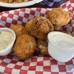 Fried mushrooms with cream gravy and ranch dressing.