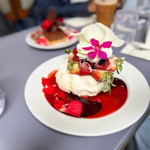 Photo of Extraordinary Desserts - San Diego, CA, United States. Pavlova (Gluten Free)