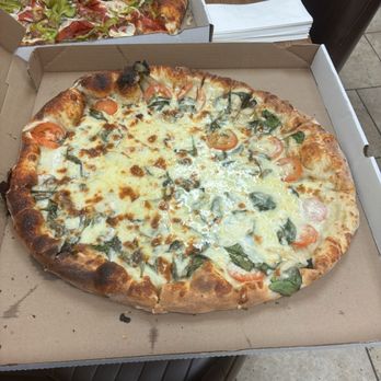 Shelly Pie - Tomato and Spinach. Damn good! - New American Near Me - Turtle Creek, Pennsylvania