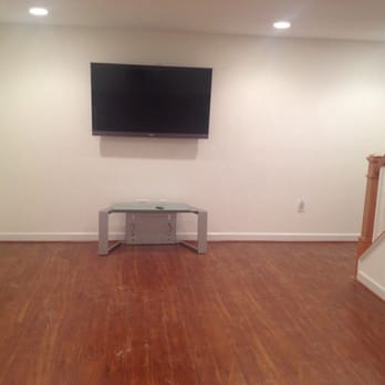 Calabrese Home Improvement - Flooring in man cave room - General Contractors Near Me - Leesburg, Virginia