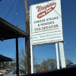 WEEYUMS sign